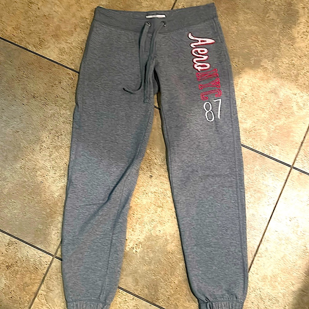 Woman’s Aeropostale size XS grey sweatpants with pink writing